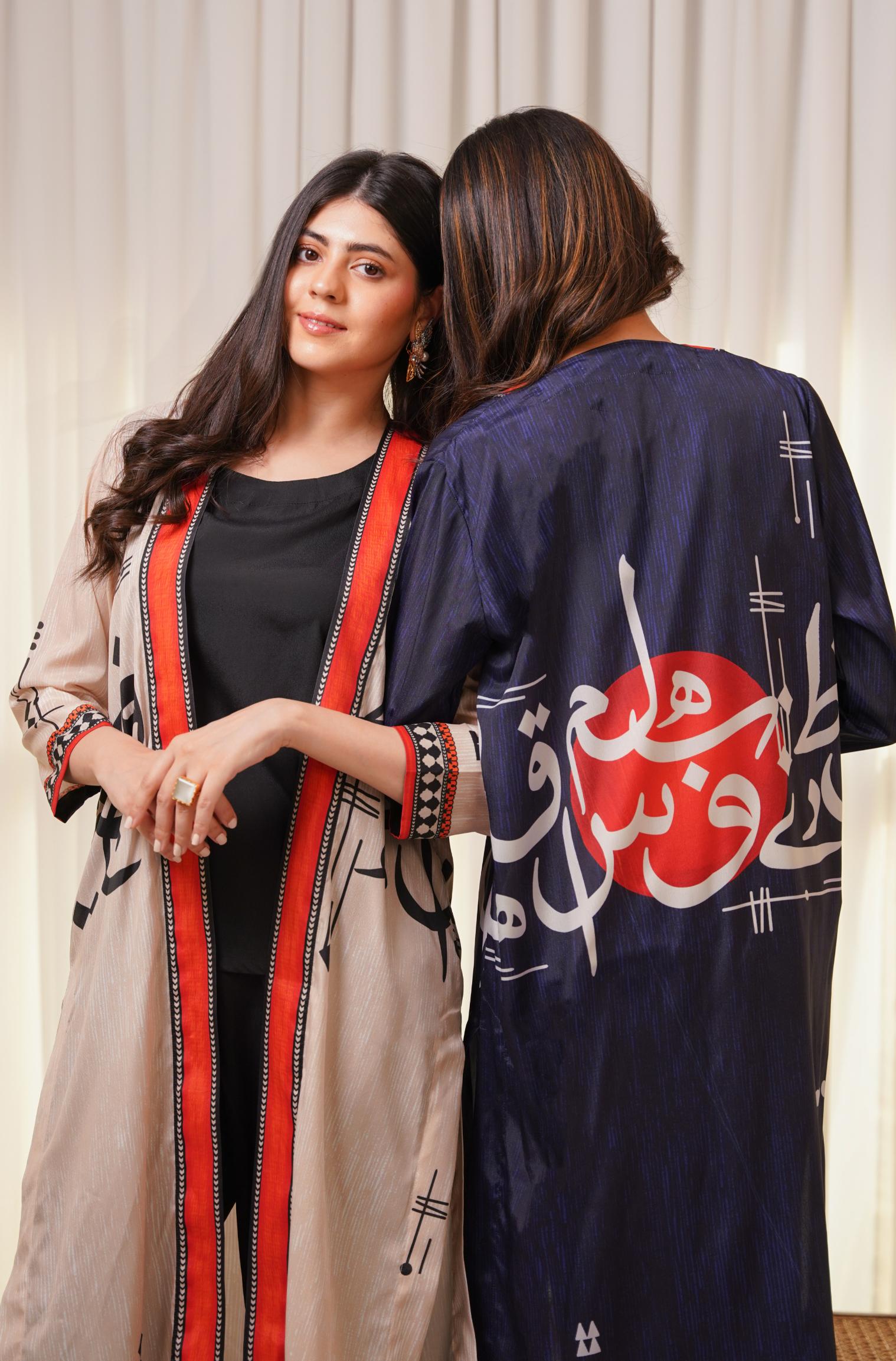 Shopmanto, wear manto, manto clothing brand, manto pakistan, ladies clothing brand, urdu calligraphy clothing, wear manto shades of dawn women front open upper cape sooraj shrug with urdu calligraphy