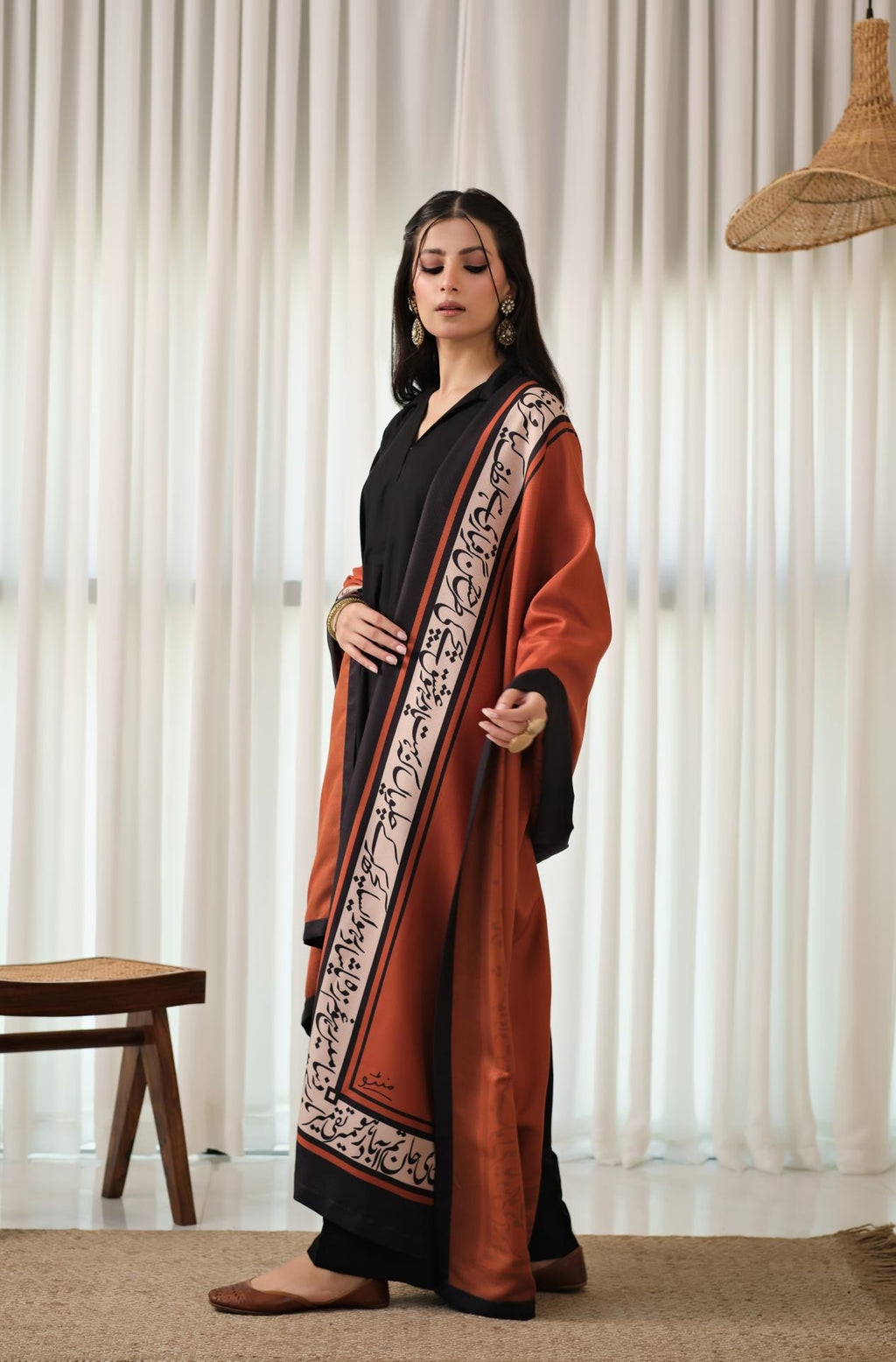 Manto's Unisex Rustic Orange Winter Shawl featuring Urdu Calligraphy on the Borders