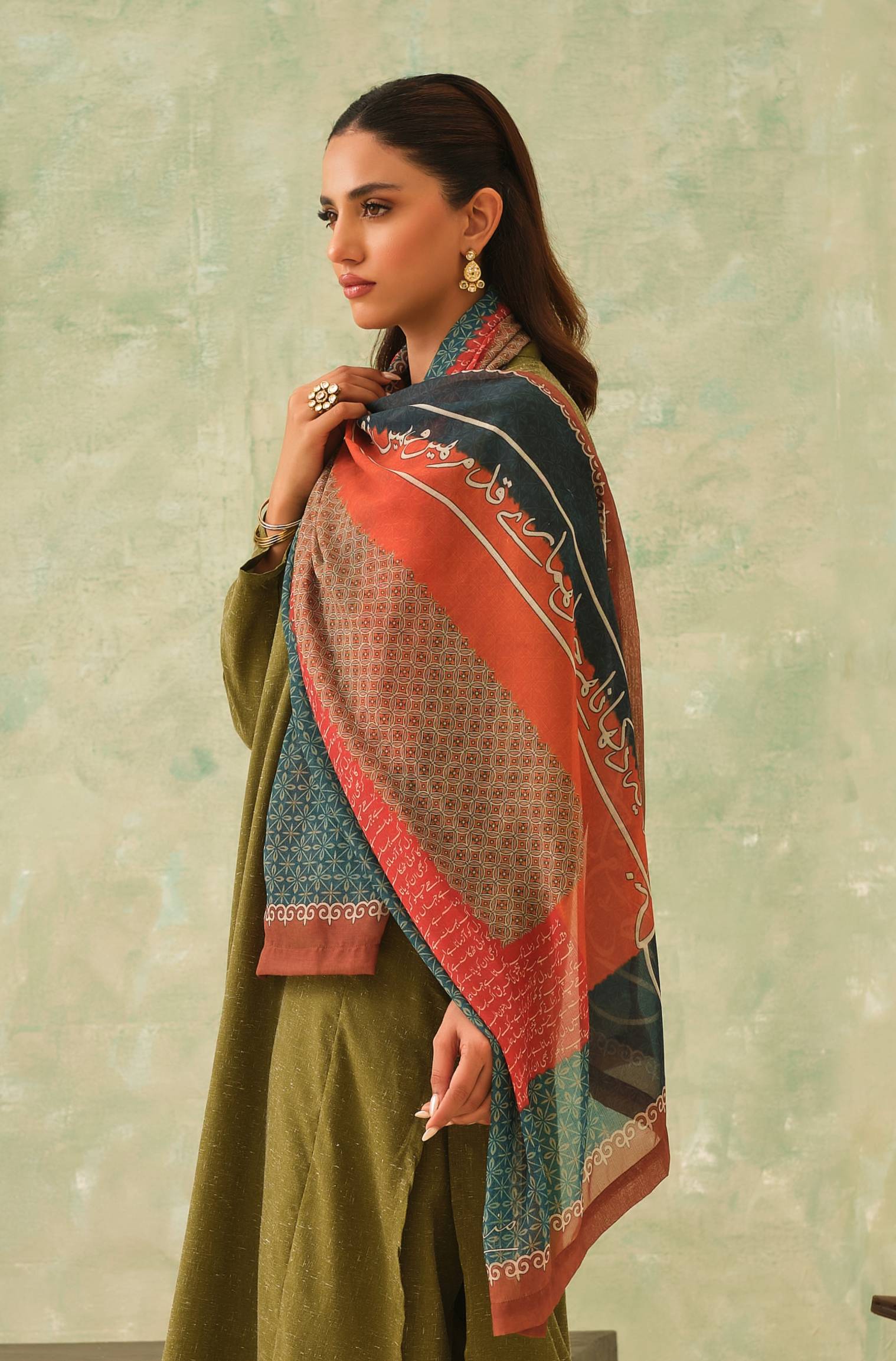 Manto's Hijab Friendly Scarf with Urdu Calligraphy Paired with Green Solid Co-Ord