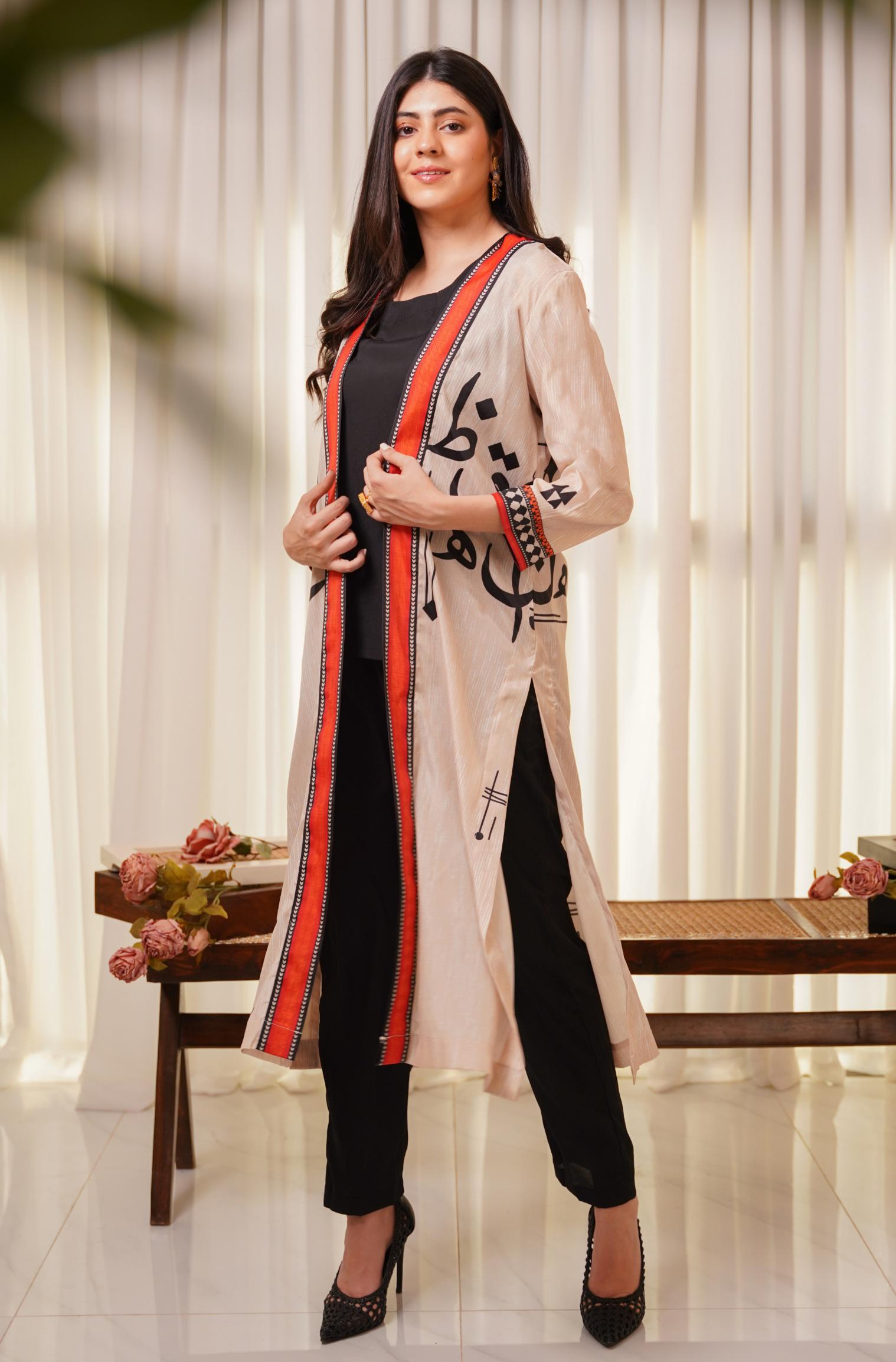 Shopmanto, wear manto, manto clothing brand, manto pakistan, ladies clothing brand, urdu calligraphy clothing, wear manto shades of dawn women front open upper cape sooraj shrug with urdu calligraphy