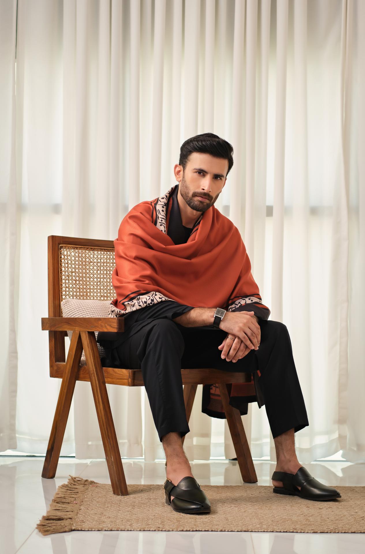 Manto's Unisex Rustic Orange Winter Shawl featuring Urdu Calligraphy on the Borders