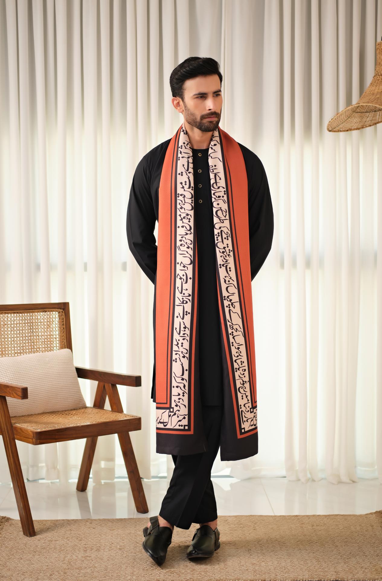 Manto's Unisex Rustic Orange Winter Shawl featuring Urdu Calligraphy on the Borders