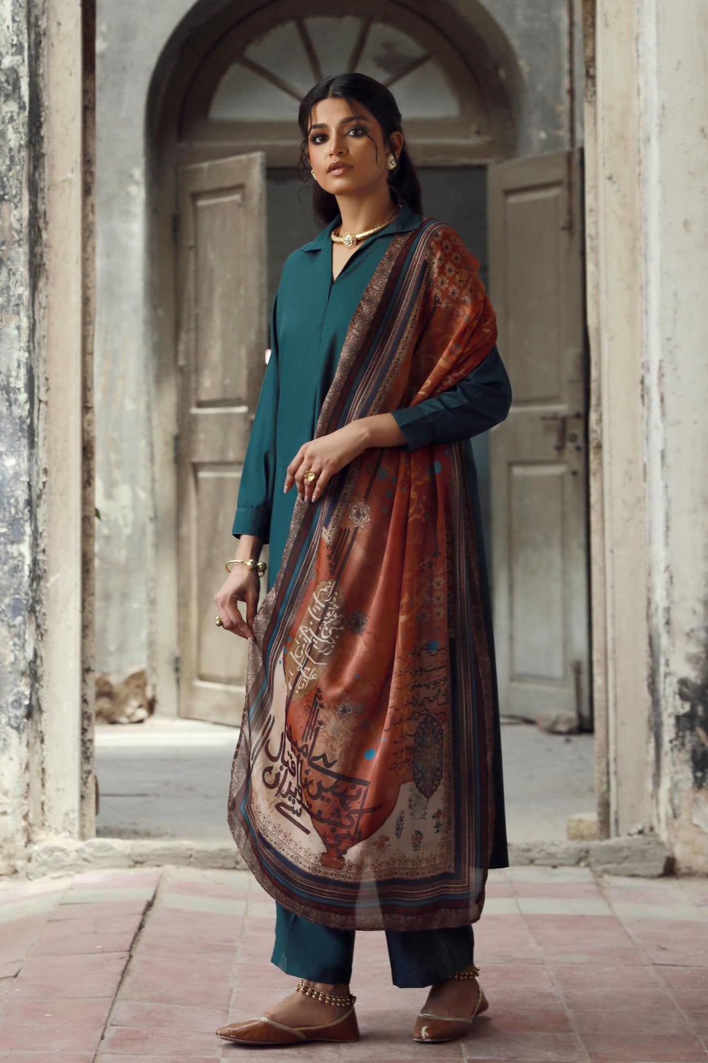 Manto Women's Crinkle Silk Rust Dasht Scarf featuring Urdu Calligraphy of Words by Allama Iqbal Paired with Deep Teal Solid Co-Ord Set