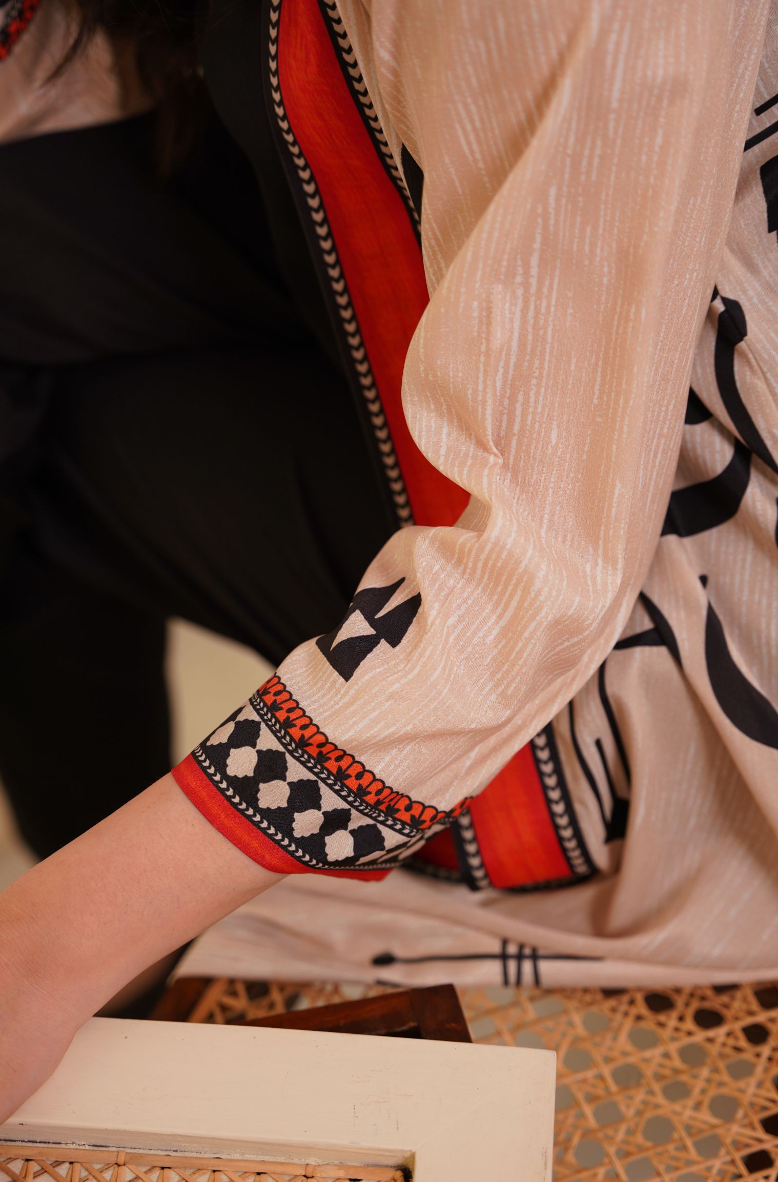 Shopmanto, wear manto, manto clothing brand, manto pakistan, ladies clothing brand, urdu calligraphy clothing, wear manto shades of dawn women front open upper cape sooraj shrug with urdu calligraphy