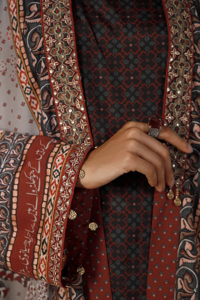 Woman wearing Manto's long, patterned coat, featuring Urdu calligraph & Illustration