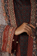 Woman wearing Manto's long, patterned coat, featuring Urdu calligraph & Illustration
