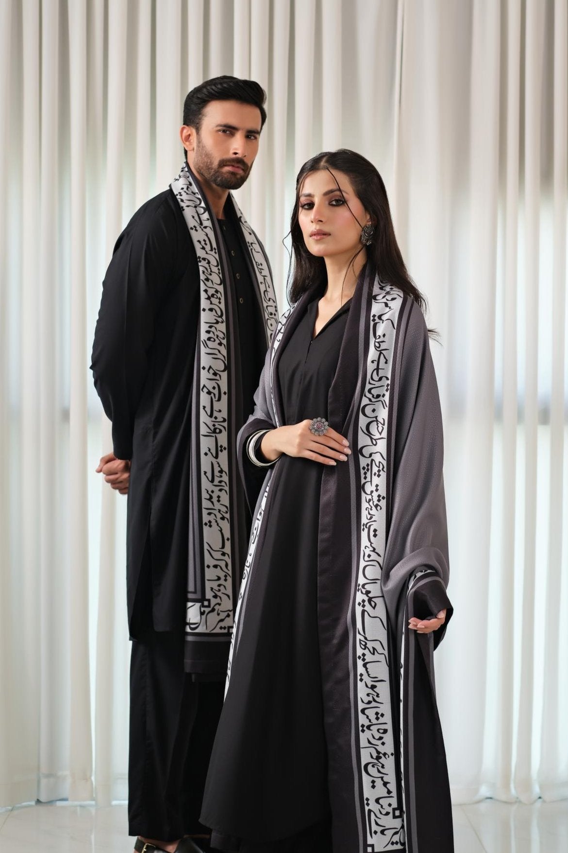 Manto's Unisex Grey Winter Shawl featuring Urdu Calligraphy on the Borders