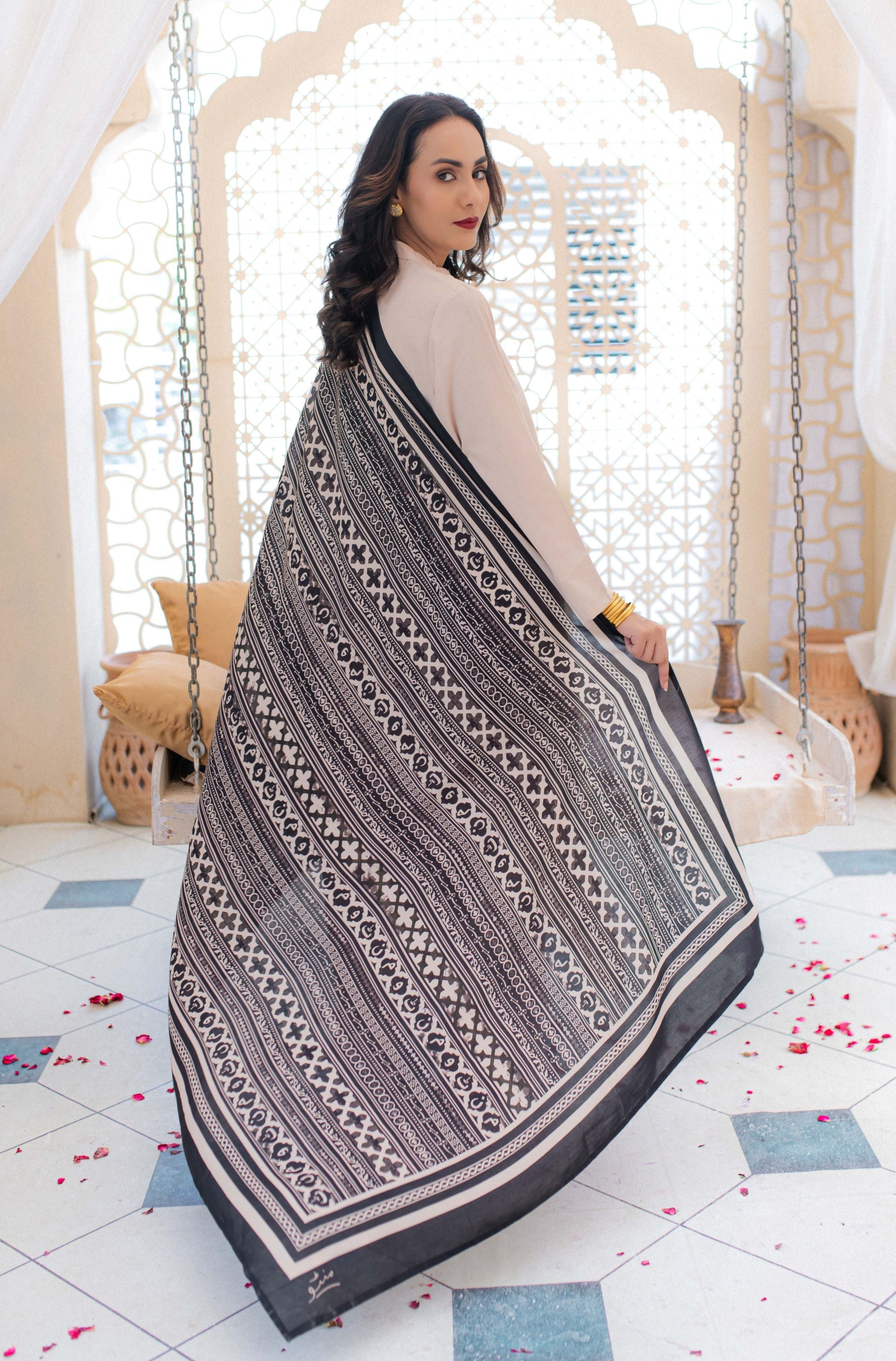 Shopmanto, wear manto, odhni, shawl, chaddar, manto odhni, manto scarves, manto stoles, manto, clothing brands, women shawl, ladies shawl, women shawl in black, women shawl with random words calligraphed in urdu, black odhni, dupatta, black dupatta, urdu calligraphy, urdu calligraphy clothes, manto calligraphy clothes, riwayat odhni, black, manto riwayat odhni, riwayat odhni monochrome