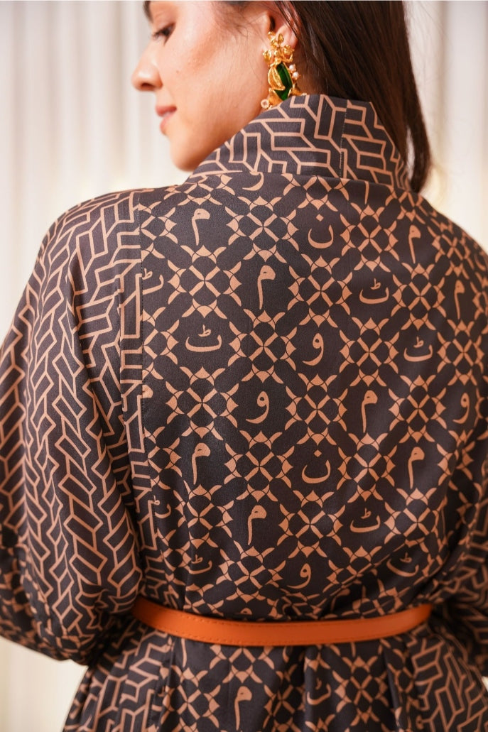 Shopmanto, wear manto, manto clothing brand, manto pakistan, ladies clothing brand, urdu calligraphy clothing, wear manto shrugs, ayra shrug black and gold with urdu calligraphy, women shrugs with urdu calligraphy, women front open upper 